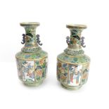 A pair of 19th century two-handled Chinese porcelain vases: the lips with Greek-style key frets