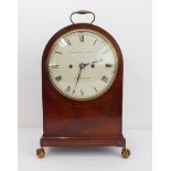 An early 19th century mahogany arched double fusee mantel clock with pull repeat by Dwerrihouse &