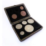 A cased part-set of 1935 GB coins: farthing; halfpenny; penny; sixpence; shilling; florin; half
