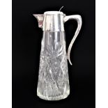 A late 19th to early 20th century cut-glass and silver-plate-mounted claret jug: tapering conical
