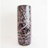 A Chinese porcelain stick-stand of cylindrical form and decorated in enamels with prunus blossom (