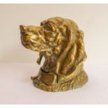 A highly unusual (probably French) late 19th century brass cigar-holder modelled as a spaniel's