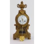 A 19th century French gilt-metal-cased eight-day mantle clock in Louis XVI style. The two-handled