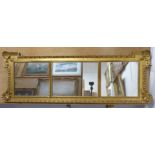 A George II style (probably 19th century) carved giltwood framed triple-plate overmantle looking