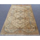 A contemporary Turkish Milas rug with ivory ground and stylised leaf and flower motifs. (197 x 120
