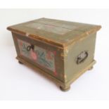 A small 19th century painted Eastern European chest: the hinged lid with strap hinges and opening to