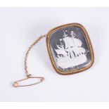 A 19th century 9ct rose gold sulphide intaglio brooch: depicting a 17th century gun ship, with