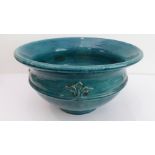 A large hand-potted studioware-style bowl with turquoise crackle-glaze finish: central band with