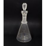 A 19th century conical ship's style decanter with faceted stopper and star-cut base: the neck with