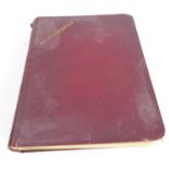 An interesting early 20th century autograph book with annotations, sketches and autographs, the