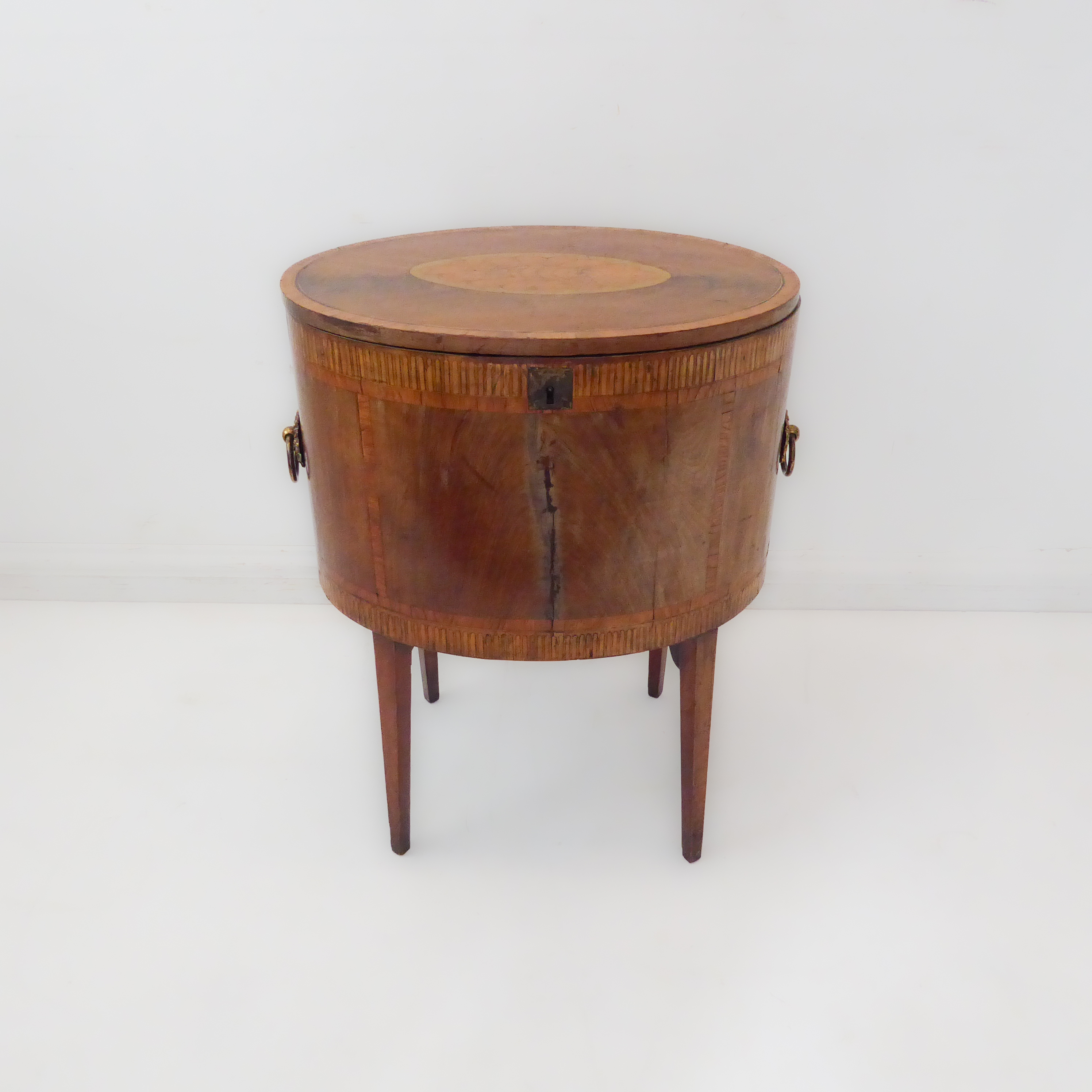 A late 18th century George III period mahogany, satinwood crossbanded and marquetry cellarette of