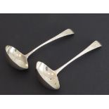 A pair of George III period hallmarked silver ladles by Peter Ann and William Bateman: each with