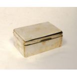 A hallmarked silver cedar-lined cigarette box (various dents and damage), monogrammed and