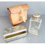 An early 20th century leather-cased hunting sandwich box and flask. The case in hand-stitched