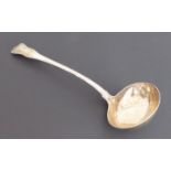 An early 19th century double-struck fiddle-and-thread pattern hallmarked silver ladle: London