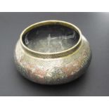 An interesting late 19th-early 20th century copper and white-metal inlaid brass bowl: three panels