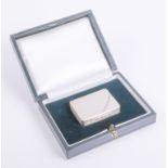 A fine quality hallmarked silver snuff box: engine-turned decoration and the lid with textured