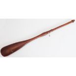 A 19th century African hardwood staff of good patination: well balanced and with a bulge to the
