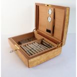A very fine custom made masur birch humidor (with contents) by Jeremy Simpson of The Exquisite Box
