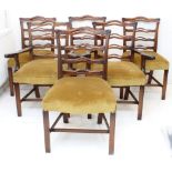 A set of six (4 + 2) 18th century style (later reproductions) mahogany dining chairs with stuff-over