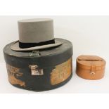 A Dunn & Co (Piccadilly Circus) grey top hat, a hat box with liner labels and a light-brown