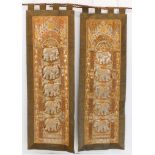 A pair of (possibly Thai) decorative wall-hangings: gold-coloured thread with sequins and glass