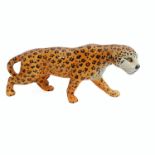 A large Beswick model of a prowling leopard (29.75 cm). (Restoration to ear)