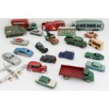 An assortment of unboxed Dinky die-cast models to include a transporter, army vehicles, Santa in a