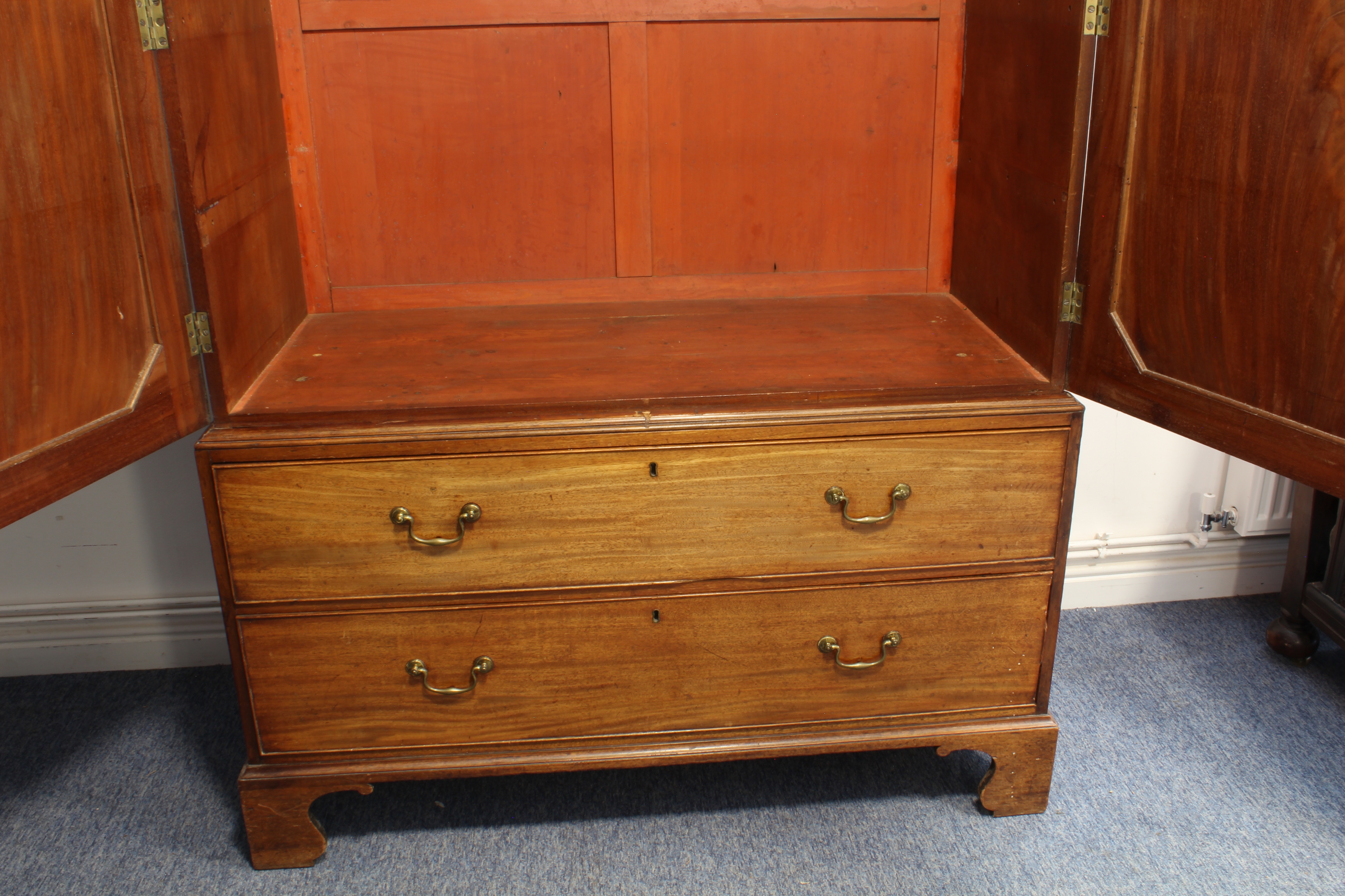 A late 18th century mahogany linen press: short outset cornice above two figured panel doors - Image 3 of 3