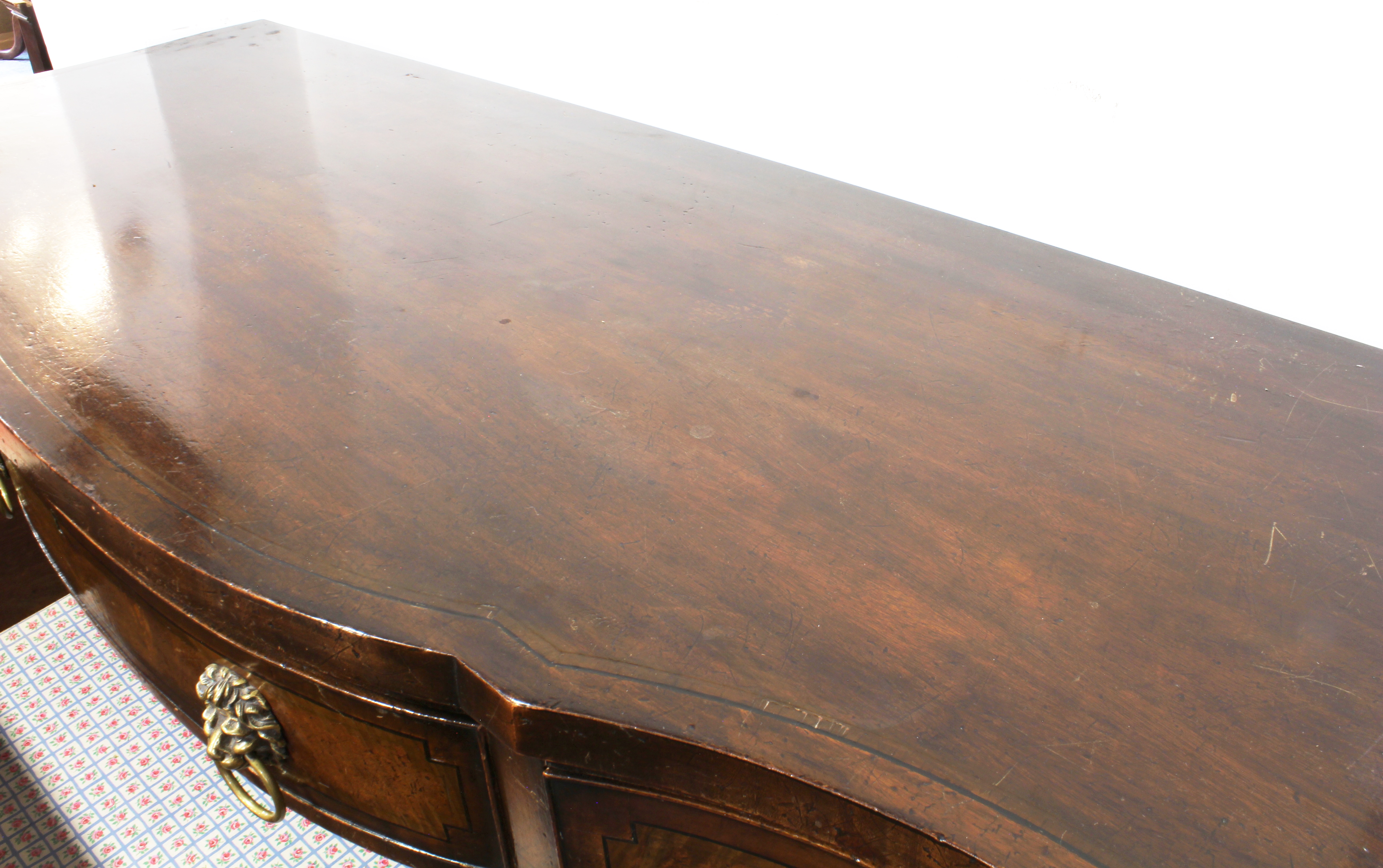 A serpentine-fronted mahogany and ebony-strung sideboard: central bow-fronted drawer above a slide- - Image 5 of 5