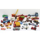 An assortment of unboxed Dinky, Matchbox, Tonka and Corgi die-cast models to include trailers, newer