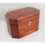A late 18th century octagonal oak tea caddy with unusual division and Anglesey kite-shaped bone