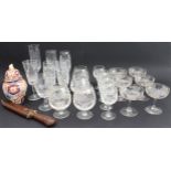 A mixed lot to include: a set of six cut-glass champagne saucers; six assorted champagne flutes; a