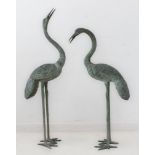 Two verdigris bronze water spires (fountain heads) modelled as storks (the taller 108 cm high)