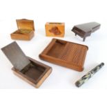 Four pieces of treen and two other pieces: a sycamore matchbox cover decorated with a setter's head;