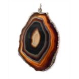 A large irregular-shaped banded agate pendant with silver-mounted border and suspension loop: the
