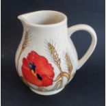 A modern Moorcroft pottery jug of of Art Nouveau inspiration: baluster form, decorated with