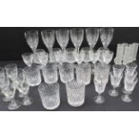 Fine drinking glasses to include: 1.  a set of six diamond-cut tumblers, five brandy balloons and