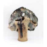 An interesting contemporary free-form sculpture of a stylised tree, part-glazed earthenware,