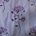 A pair of lavender and gold shot silk-effect curtains embroidered with sprigs of flowers; triple