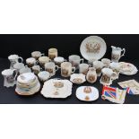 A collection of royal commemorative tankards, cups and saucers, and plates (mostly early to mid 20th