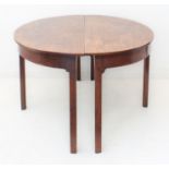 A pair of late 18th/early 19th century D-end mahogany side tables on square chamfered legs (formerly