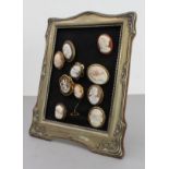 A collection of ten cameo brooches mounted on an early 20th century Art Nouveau style silver-