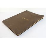 An early 20th century photograph album, the cover titled 'Lockinge' in gilt lettering (39 x 29 cm)