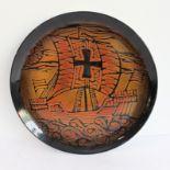 A wall-hanging Poole Pottery charger in the Aegean pattern (32.25 cm in diameter)
