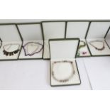 Seven lady's necklaces (six boxed): 1930s paste; 1920s gilded; amethyst; quartz; small white