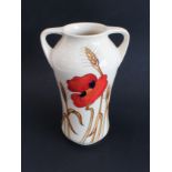 A modern two-handled Moorcroft Pottery vase of Art Nouveau inspiration: tube lined and decorated