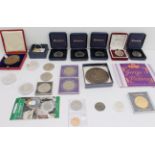 A quantity of commemorative coins and crowns to include: a 1902 Edward VII coronation medal in its