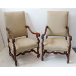 A fine pair of show-wood upholstered armchairs of large proportions and in late 17th century