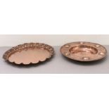 Two pieces of copperware: 1. an Arts & Crafts style and period hand-hammered circular copper dish,